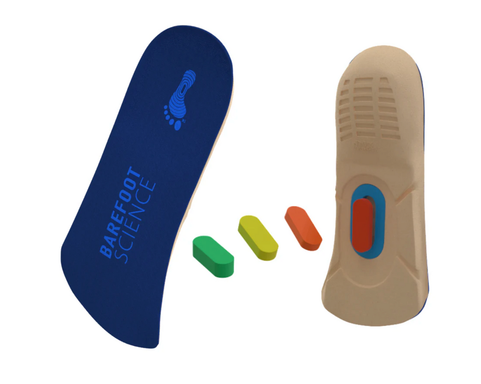 Biopods Barefoot Science 3/4 length insoles from the 5-step system, showing four layered orthotic insoles with textured surfaces.