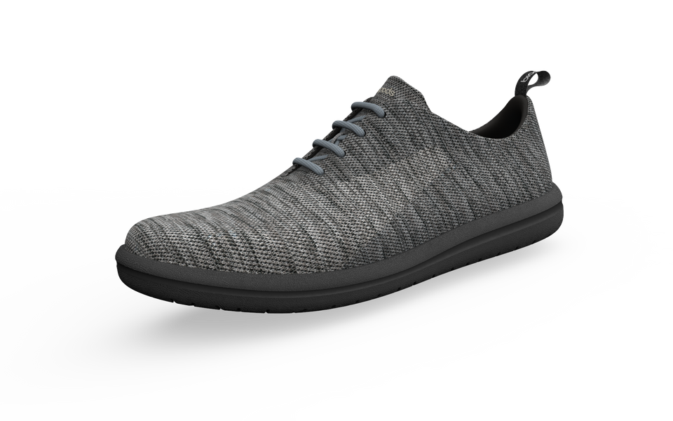 Narrow classic grey sneakers by Biopods, front profile showing smooth canvas upper and white rubber sole.