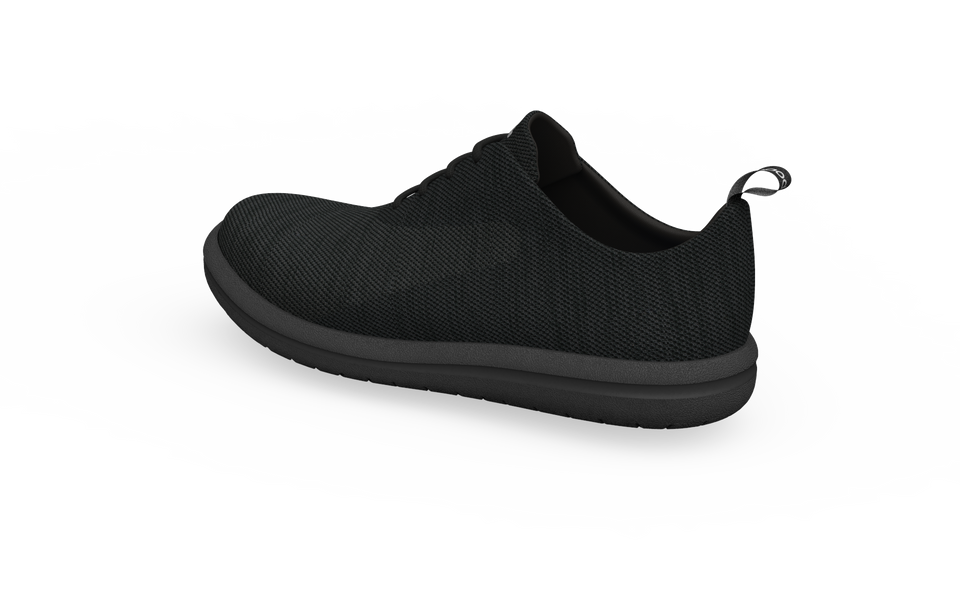Rear profile of black Biopods Classic Sneakers showing the classic sneaker design and heel details.