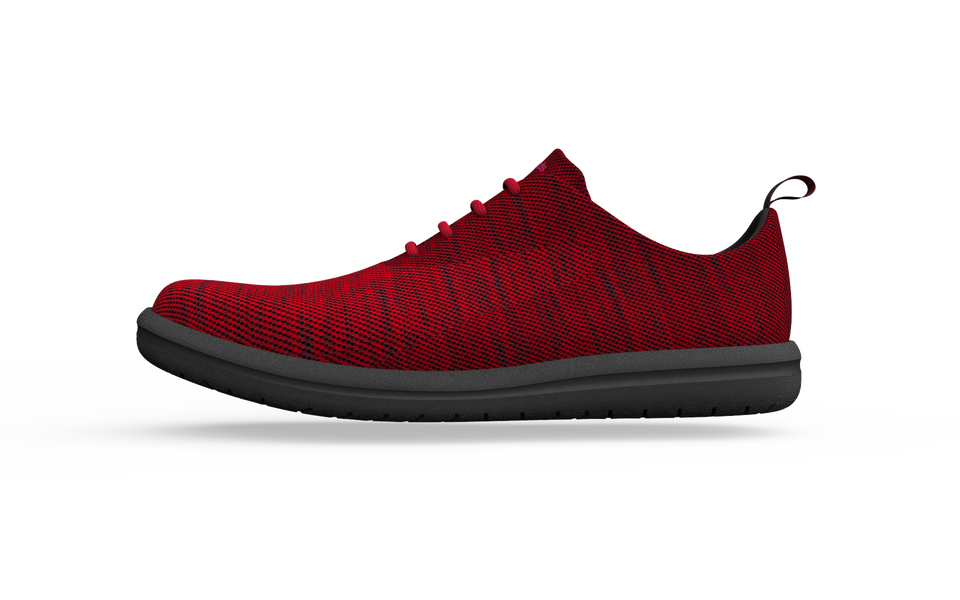 Red wide classic sneakers by Biopods, side view showing comfortable fit and stylish design with laces and rubber sole.