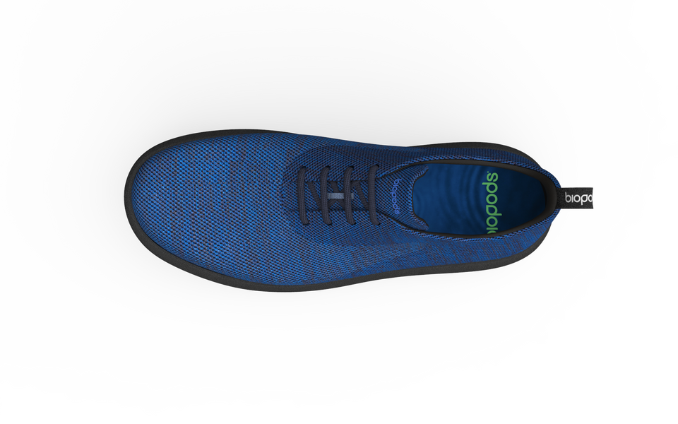 Wide classic sneakers in sapphire blue by Biopods, featuring a comfortable design and stylish laces on a clean white background.