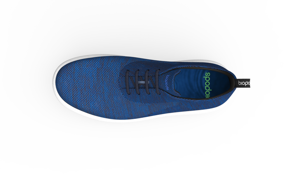 Narrow classic sneakers by Biopods in sapphire blue, featuring a sleek design and white rubber soles.