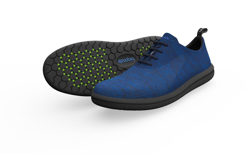 Pair of Biopods Classic Sneakers in sapphire blue, showcasing the side profile with white sole and sleek design.