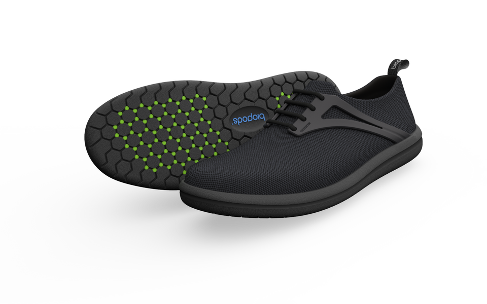 Pair of black Urban Flex Sneakers by Biopods, showcasing their sleek design and comfortable fit for urban casual wear.