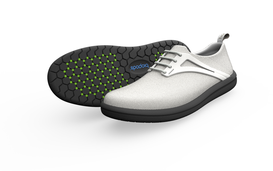 Pair of white Biopods Urban Flex Sneakers with sleek design and comfortable fit, shown from front angle on a plain background.