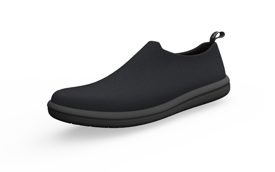 Black wide urban sneakers by Biopods, front profile showing sleek design and comfortable fit for city wear.