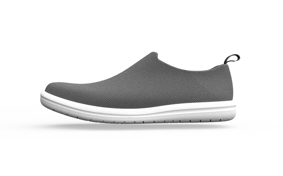 Wide grey Biopods urban sneakers shown from the side with a comfortable, stylish design and textured sole.