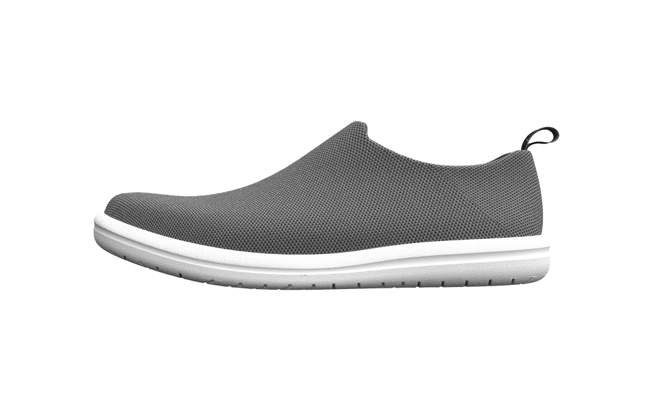 Biopods urban sneakers with custom sizing, showing side view of stylish, modern sneakers in black and white.