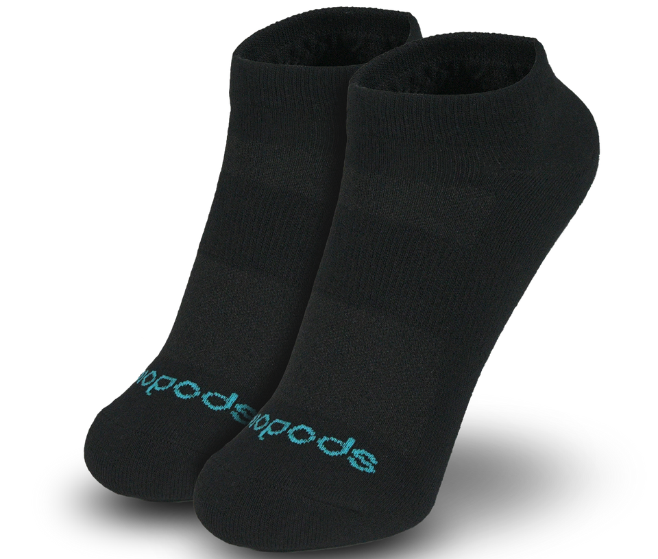 Black Biopods® Bamboo ankle socks displayed on feet, showcasing comfortable, eco-friendly sock design with bamboo fabric.