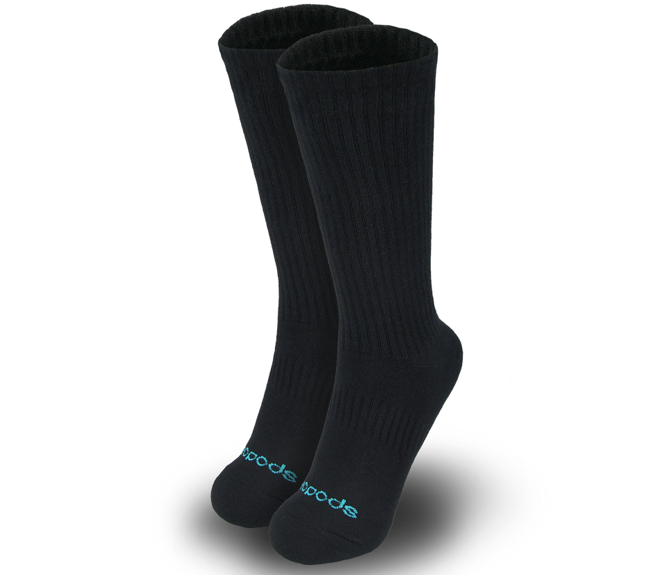Black medium Biopods bamboo athletic socks shown on feet, featuring breathable fabric and comfortable fit for active wear.