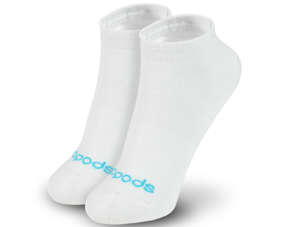 White Biopods® bamboo ankle socks displayed on a foot, showcasing soft, breathable fabric and comfortable fit.